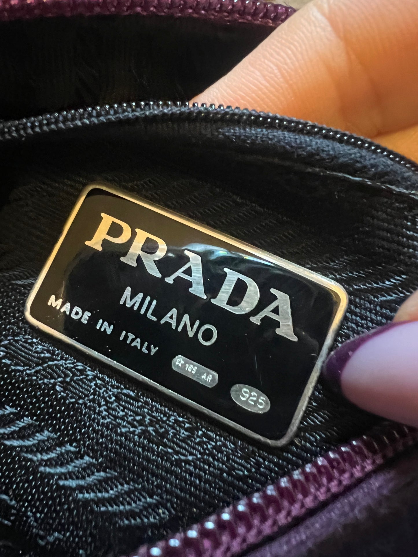 Pochette Prada in seta