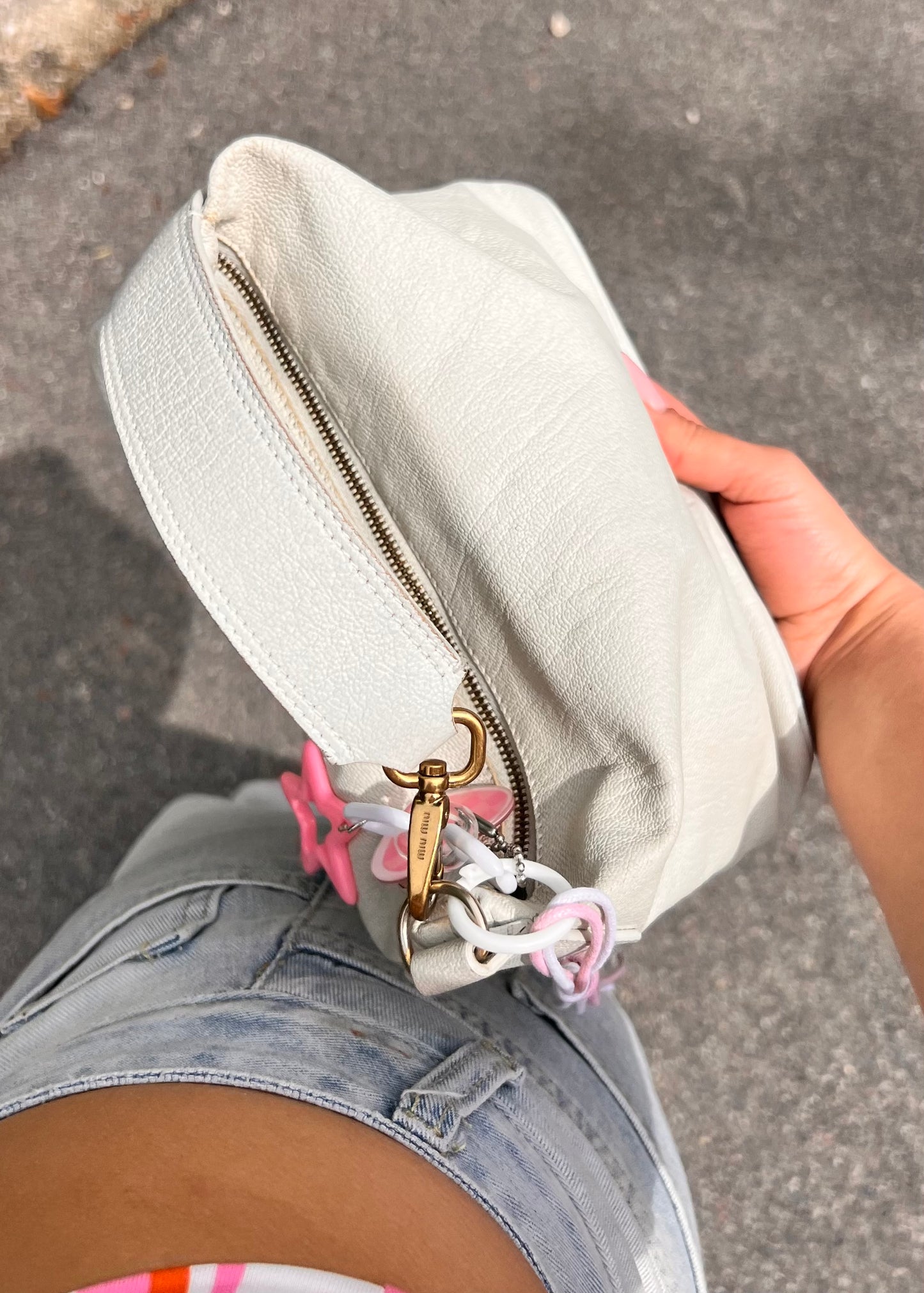 Iconic Miu Miu logo bag