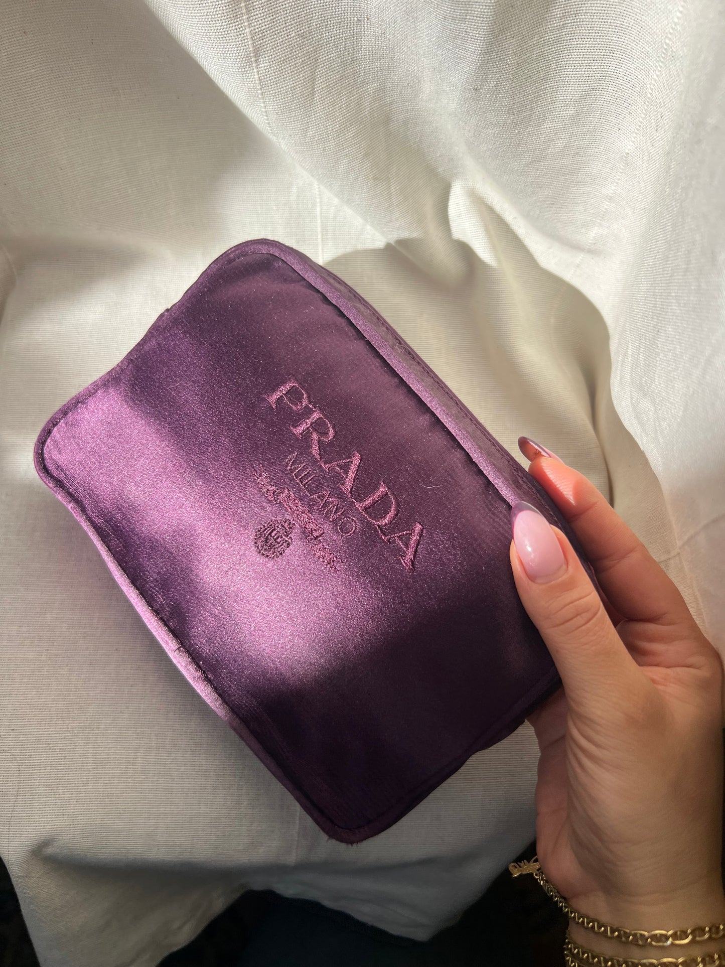 Pochette Prada in seta