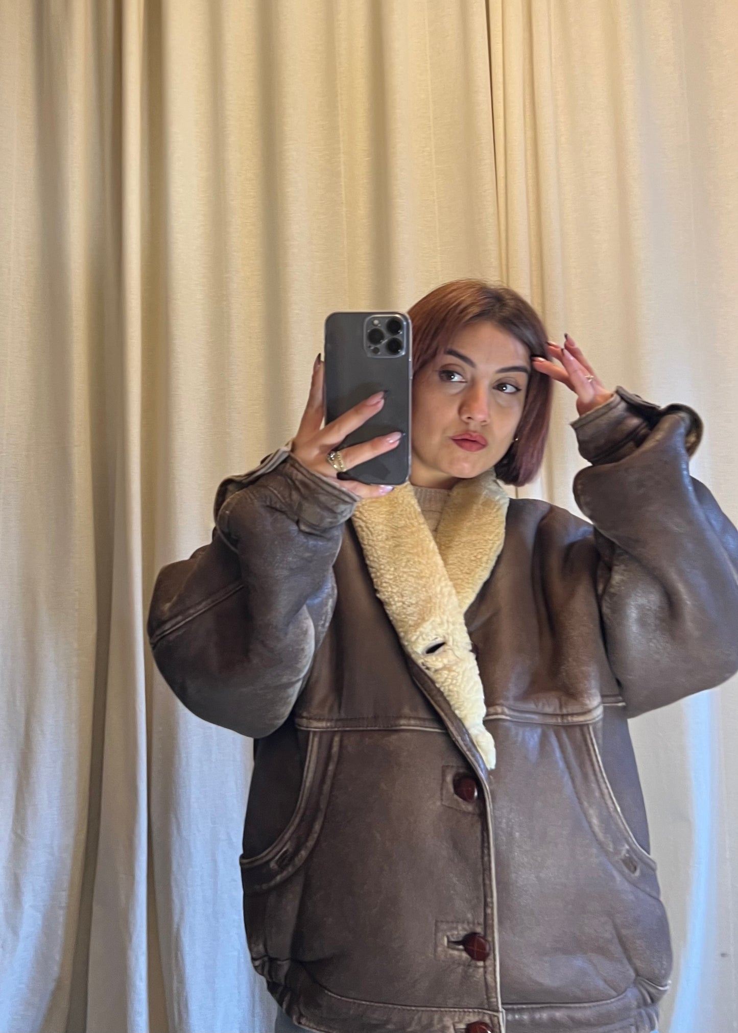 Shearling vintage in pelle invecchiata