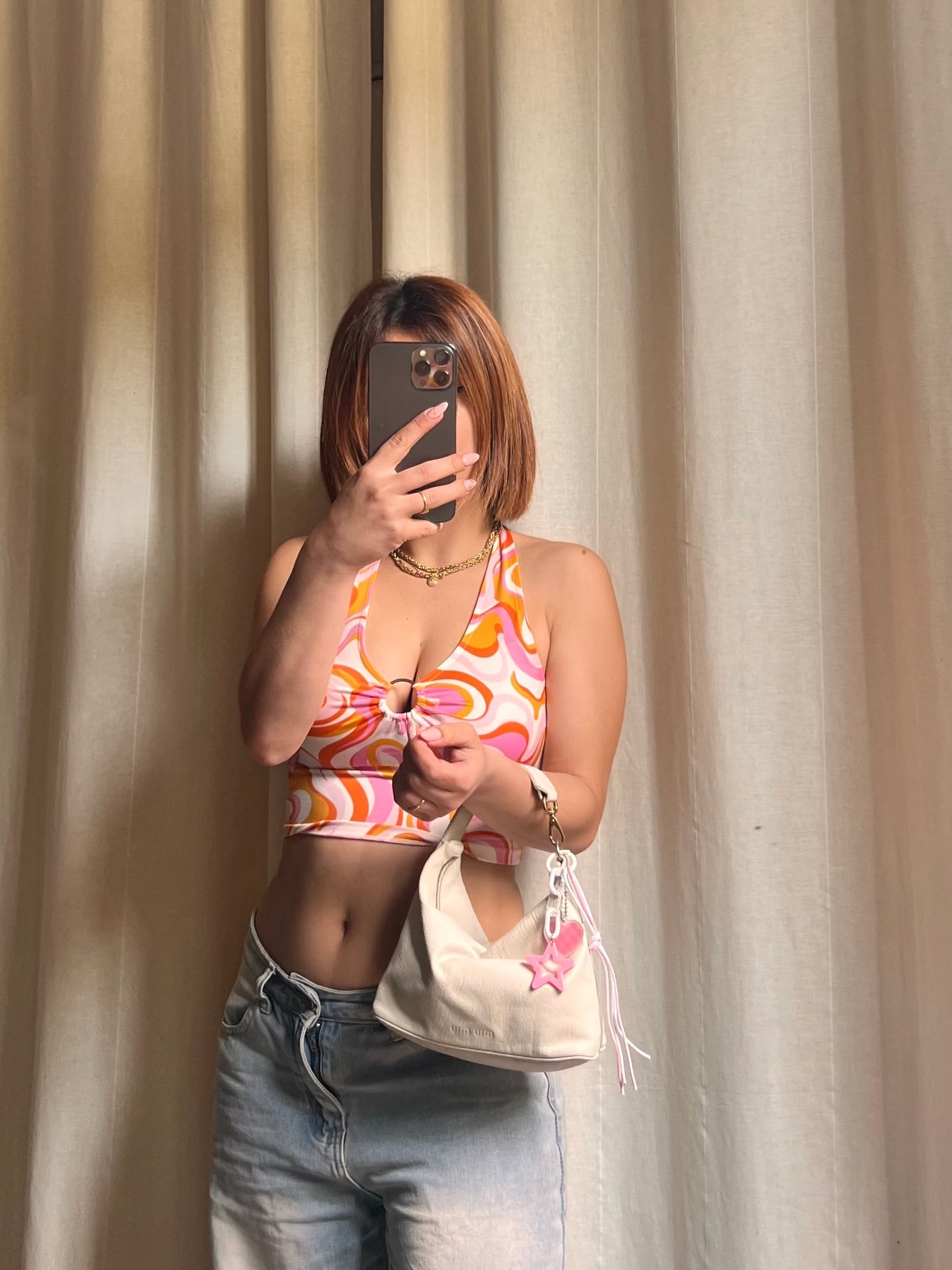 Iconic Miu Miu logo bag