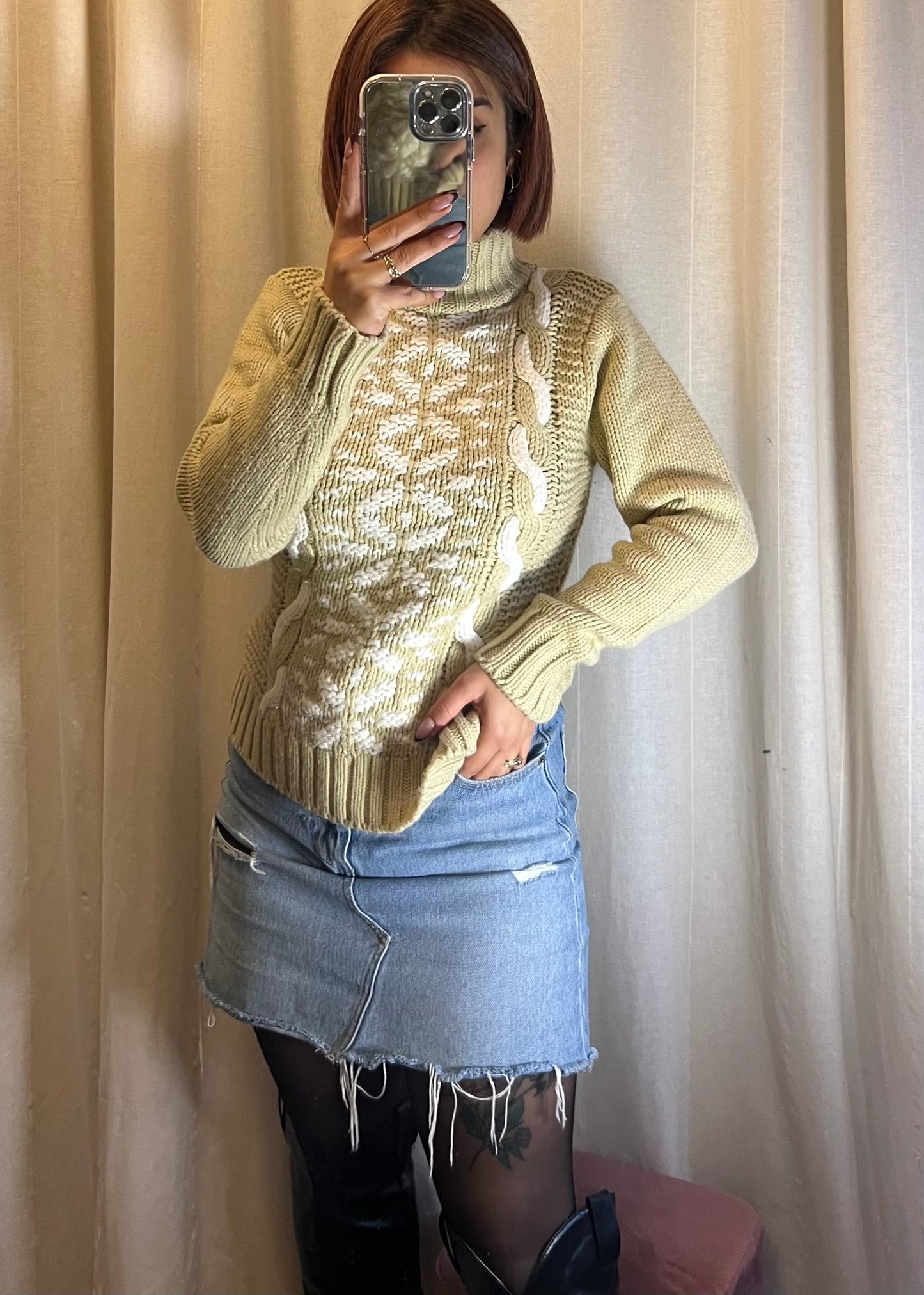 Maglione in lana a trecce