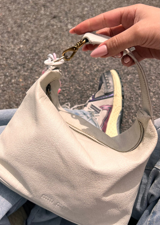 Iconic Miu Miu logo bag