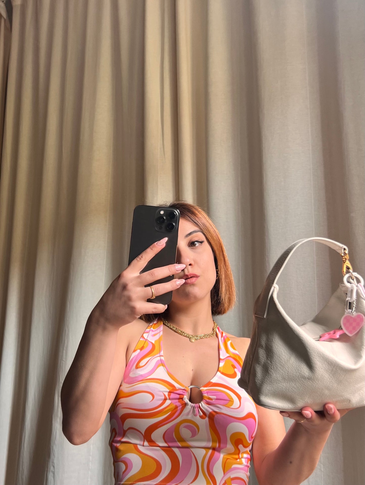 Iconic Miu Miu logo bag