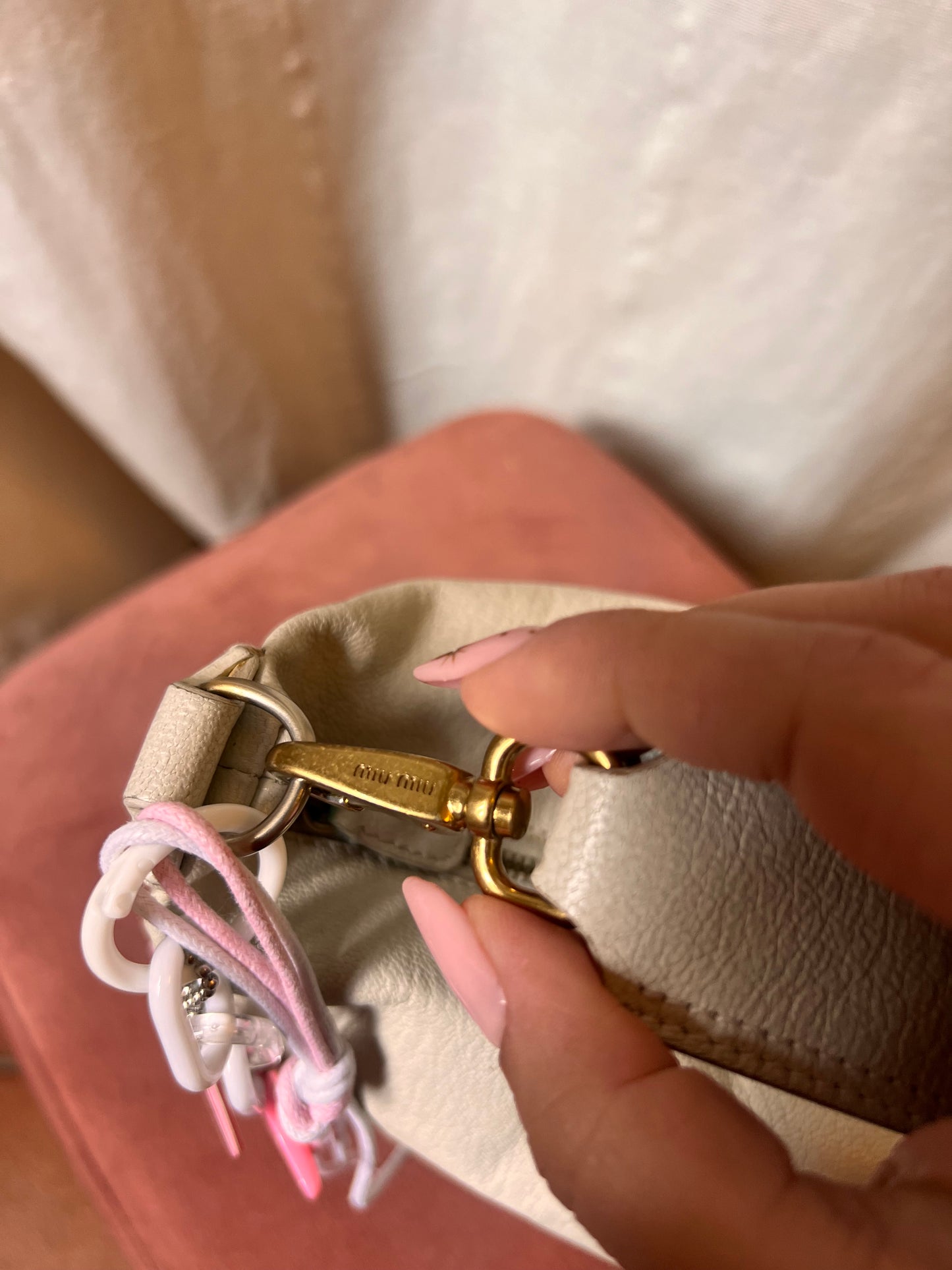 Iconic Miu Miu logo bag